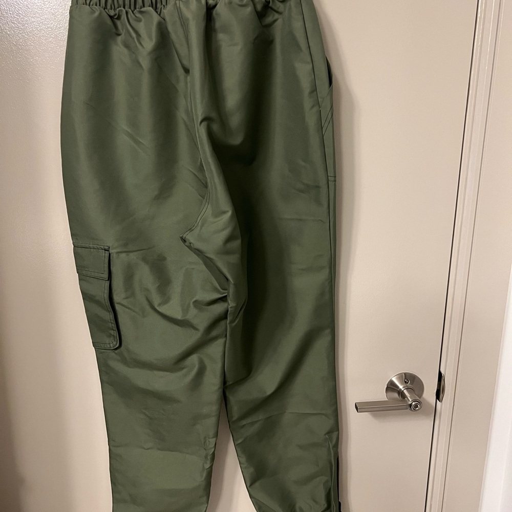 Cardi B Reebok woven satin pants with matching top.